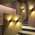 Travin Modern Conch Shape Spiral Outdoor Wall Lamp, Black/White/Gold - Lamp Outdoor